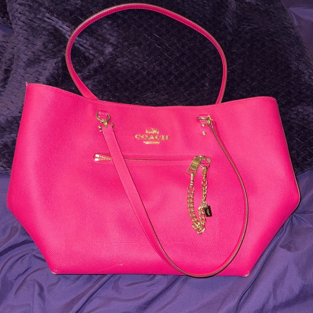 Women’s hot pink Coach purse